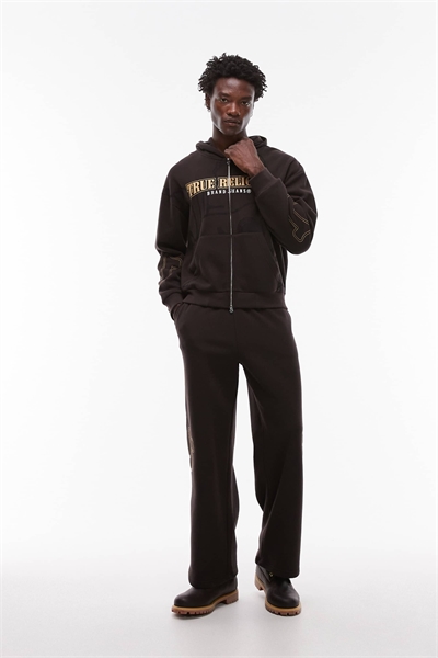 Комплект из широких джоггеров с логотипом Big T коричневого цвета артикул 149853126