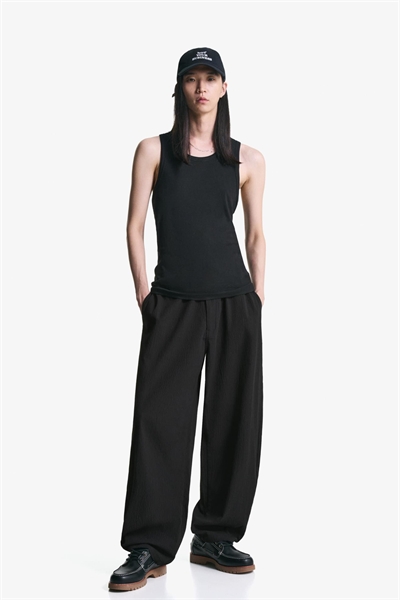 Джоггеры свободного кроя черного цвета артикул 150334247