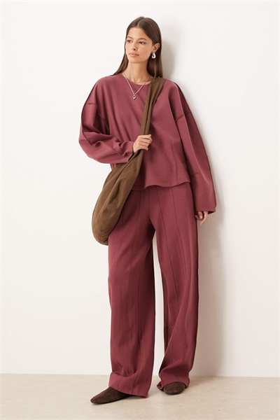 Джоггеры с широкими брючинами и декоративными швами артикул 148925755