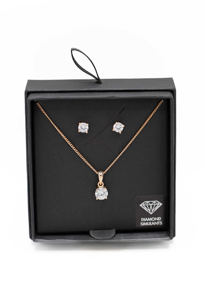 Комплект из сережек и колье с золотыми камнями, имитирующими бриллианты артикул 152397050