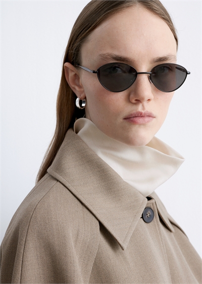 Овальные солнцезащитные очки с проволочной оправой артикул 1325971002