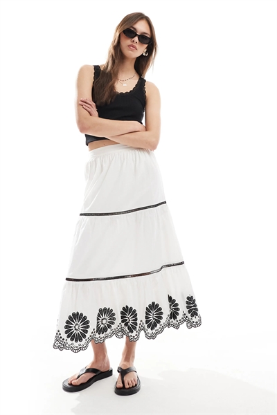 Юбка средней длины с многоуровневым цветочным подолом артикул 147562687