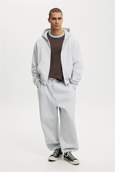 Штаны-треники с очень широкими штанинами и отворотами артикул 156163829