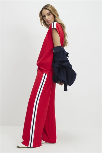 Джоггеры с широкими брючинами и боковыми вставками артикул 155894771