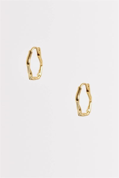 Овальные серьги-кольца с волнообразным узором артикул 153836994