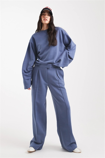 Джоггеры свободного кроя с завышенной талией и отстрочкой артикул 147082697