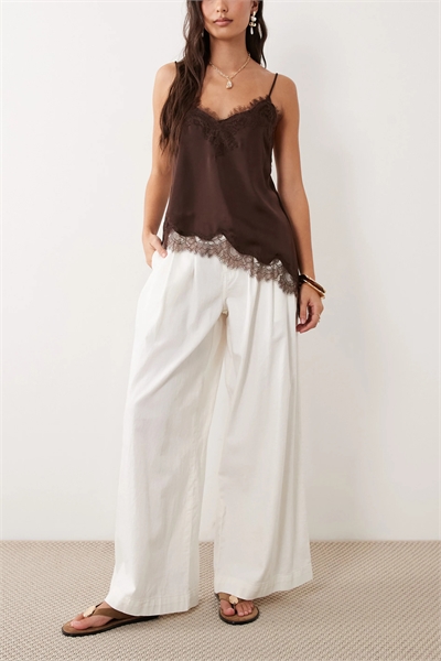 Брюки из джинсовой твиловой ткани от Archie артикул 154033273