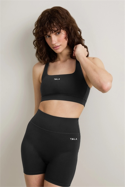 Спортивный бюстгальтер SkinLuxe с перекрещивающимися бретелями артикул 153817719