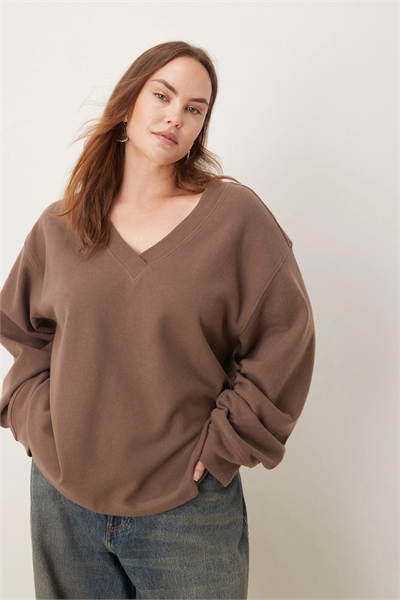 Свитер ASOS DESIGN Curve с V-образным вырезом и мягкими рукавами с рюшами артикул 149625095