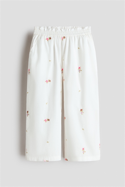 Хлопковые брюки с вышитыми элементами артикул 1341724001
