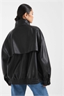 Бомбер с воротником-воронкой из искусственной кожи свободного кроя артикул 150938021