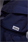 Коллекция Weekend Координационная нейлоновая ветровка с воротником-воронкой темно-синего цвета артикул 153364833