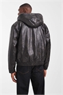 Бомбер из искусственной кожи с капюшоном на подкладке из борга черного цвета артикул 147441509