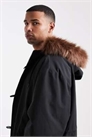 Оверсайз-пуховик с капюшоном из искусственного меха черного цвета артикул 147971553