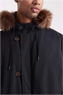 Оверсайз-пуховик с капюшоном из искусственного меха черного цвета артикул 147971553