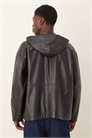 Оверсайз-куртка на молнии с капюшоном из натуральной кожи черного цвета артикул 148701967