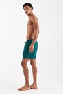 Плавательные шорты средней длины темно-зеленого цвета артикул 151417964
