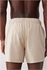 Пляжные шорты из сирсакера короткой длины бежевого цвета артикул 151417961