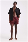 Плавательные шорты средней длины бордового цвета с контрастной белой окантовкой артикул 151099162