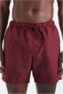 Плавательные шорты средней длины бордового цвета с контрастной белой окантовкой артикул 151099162