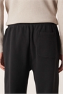 Джоггеры с логотипом и свободными манжетами артикул 155057892