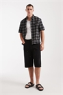 Рубашка с короткими рукавами в черную клетку артикул 155541520