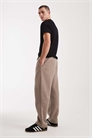 Джоггеры свободного кроя с отворотами артикул 155651337
