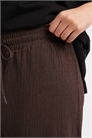 Брюки с широкими брючинами и плиссировкой артикул 152906214