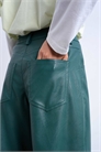 Брюки с расклешенными штанинами из искусственной кожи артикул 147698095