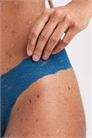 Повседневные трусики-стринги из кружева артикул 153491603