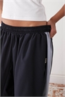 Штаны-джоггеры XL свободного кроя с вставками из нейлона артикул 155725458
