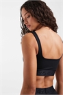 Спортивный бюстгальтер со средней степенью поддержки и жаккардовым логотипом артикул 153283854