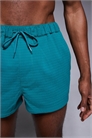 Шорты для плавания с фактурной поверхностью артикул 144642975