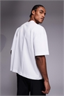 Футболка из плотного хлопка свободного кроя с заниженными плечами и технологией быстрого высыхания артикул 153246410
