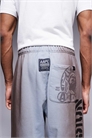 Джоггеры свободного кроя Aape by A Bathing Ape артикул 150152366