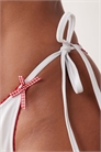Бикини-трусики с завязками по бокам и оборками артикул 151865552
