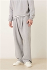 Удобные джоггеры из пике с широкими брючинами и отворотными манжетами артикул 153832254