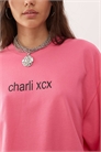 Унисекс официальная футболка Charli XCX BRAT из пике с прямым кроем и фигурой скейтера, розового цвета артикул 148884877