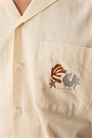 Рубашка свободного кроя с отложным воротником и вышивкой на груди артикул 147861297