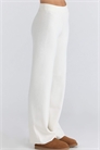 Брюки из мериносовой шерсти цвета слоновой кости от Andie артикул 155116271