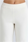 Брюки из мериносовой шерсти цвета слоновой кости от Andie артикул 155116271