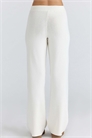 Брюки из мериносовой шерсти цвета слоновой кости от Andie артикул 155116271