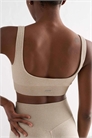 Бежевый бесшовный бюстгальтер с ребристой текстурой артикул 142297908