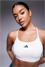 Спортивный бюстгальтер Adidas Training essentials light support белого цвета артикул 141936331