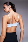 Спортивный бюстгальтер с легкой поддержкой и треугольной конструкцией артикул 147133134