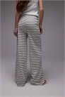 Брюки с широкими брючинами и полосками на шнурке артикул 142431244