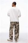 Брюки свободного кроя с принтом артикул 155120359