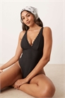 Купальник с глубоким вырезом и волнистым краем в области груди артикул 148075865