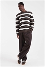 Свитер с логотипом на груди из уютного трикотажа в полоску артикул 151338330