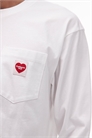 Футболка свободного кроя с длинными рукавами и карманом в форме сердца, белого цвета артикул 148713470